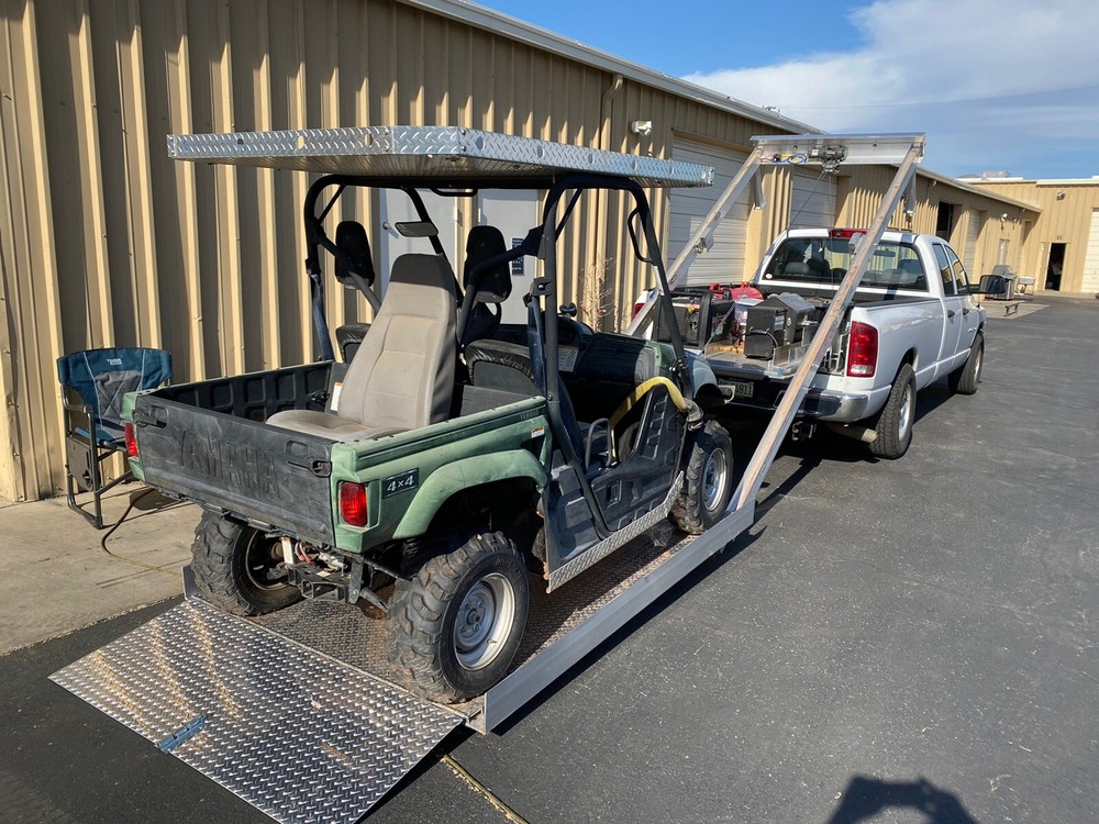 RAZOR LOADER FOR PICKUP TRUCK WITH IN BED STORAGE AND PULL AN RV