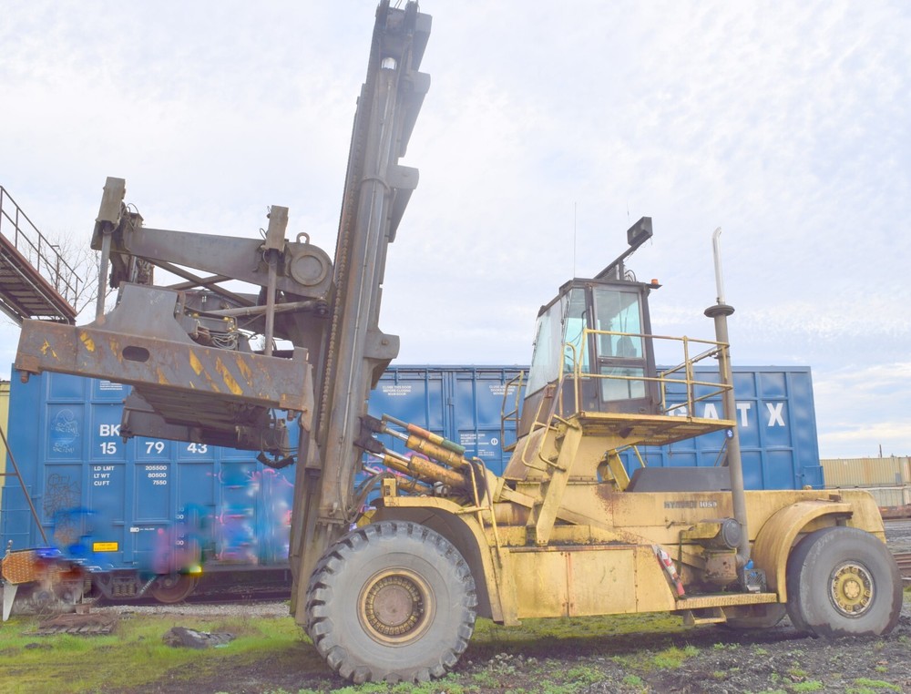 Hyster H 1050 E forklift with,  container handler Attachment, Cummins M-11,