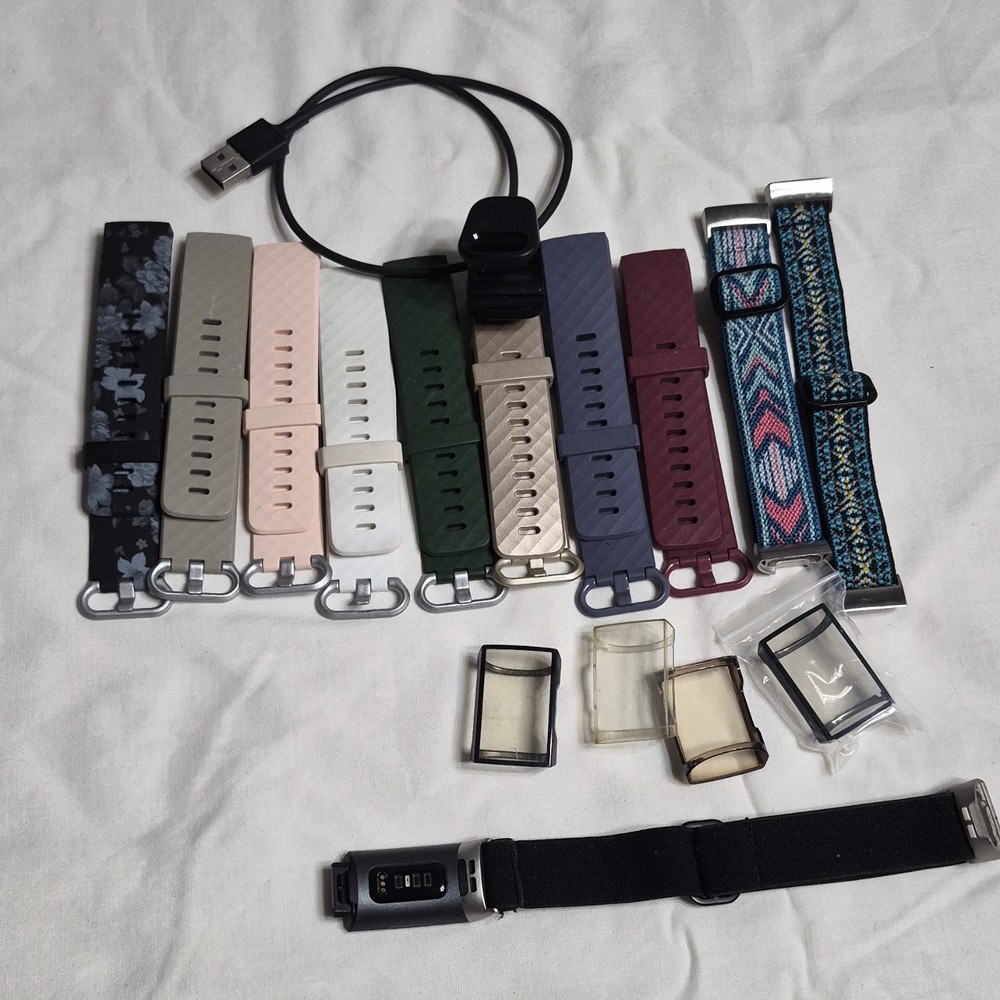 Fitbit Activity Tracker with Multiple Bands, Charging Cable, Protective Covers