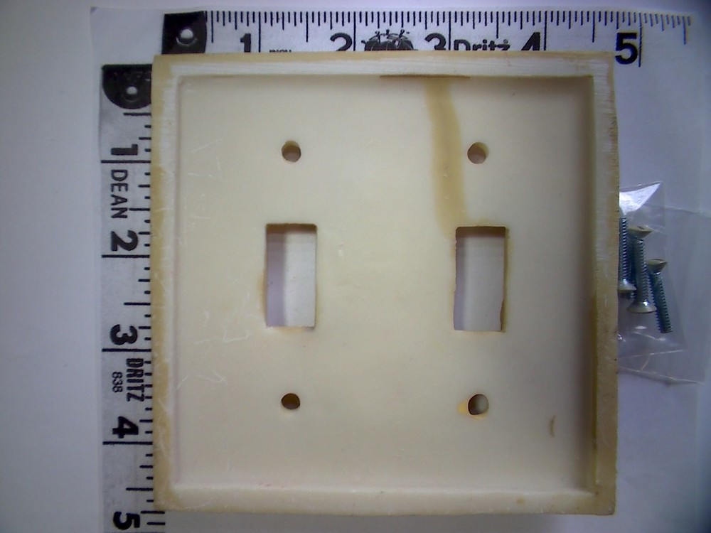 Resin Double Toggle Switchplate Featuring Colorful HATS! on a beach?