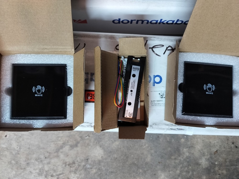 Wave touchless actuator remote transmission sensor plates with receiver.