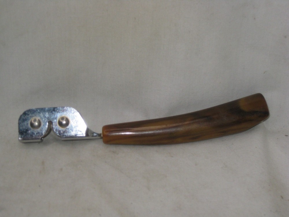 vintage marblized Bakelite handle knife sharpener sharpening utensil