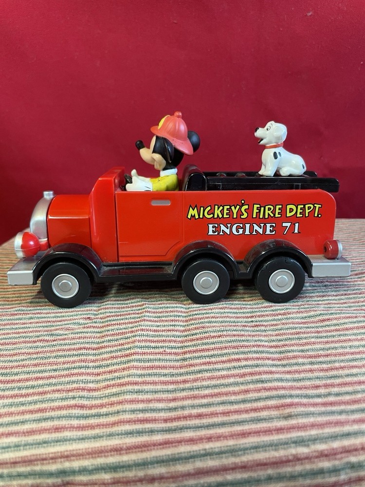 Disney's "Mickey's Fire Dept. Engine 71 Fire Truck pull back toy.