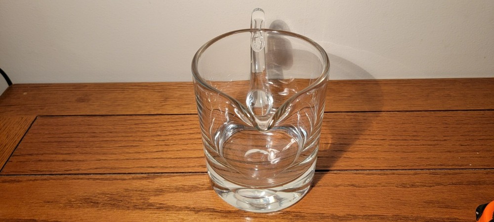 VINTAGE HAND BLOWN GLASS PITCHER WITH APPLIED HANDLE.