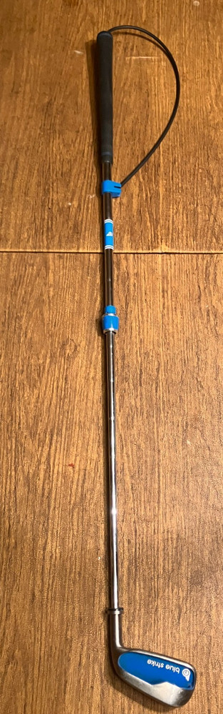 Golf swing trainer, indoor practice. blue strike
