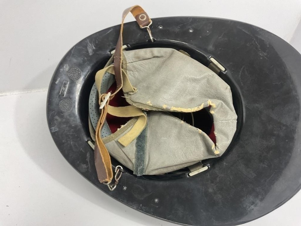 Black Firefighter Helmet front shield marked 'MEMBER 33 EVFC.