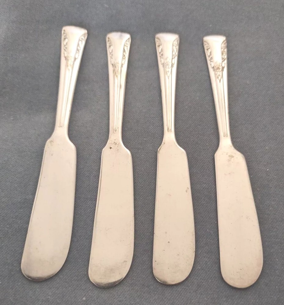 4 Silverplate Butter Spreaders International Silver Camelia pattern