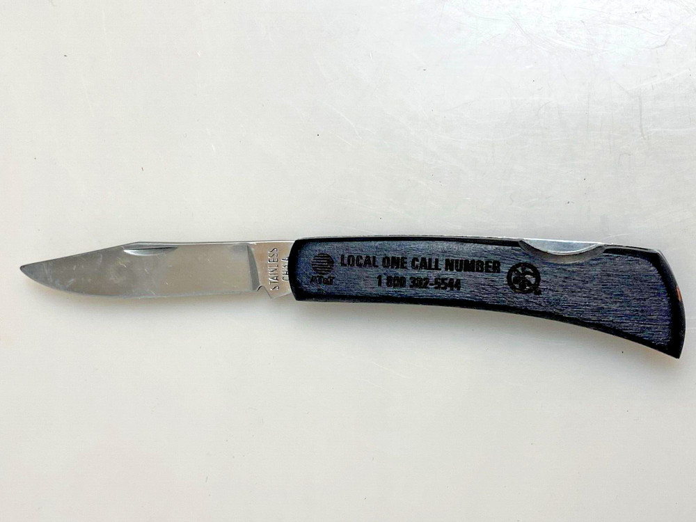 Vintage pocket knife AT&T advertisement