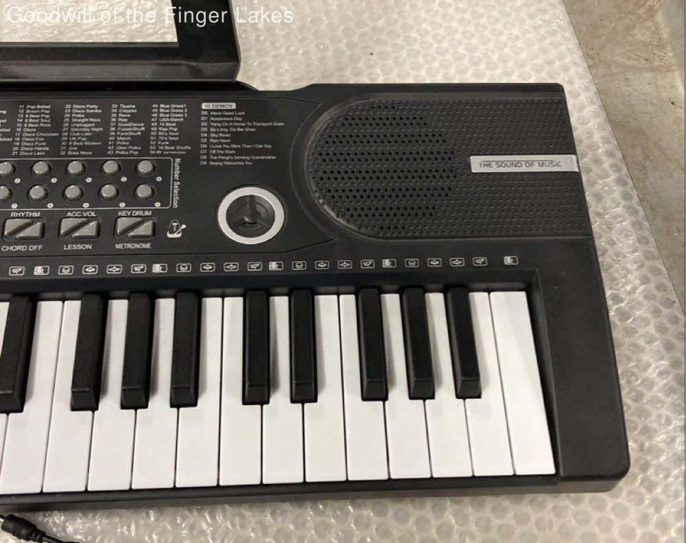 Unbranded 61Keys Electronic Keyboard Powers ON