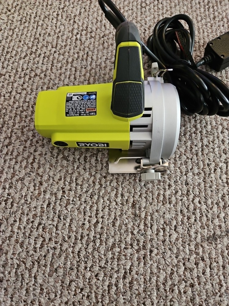 RYOBI TC401 "4" HAND HELD TILE SAW.