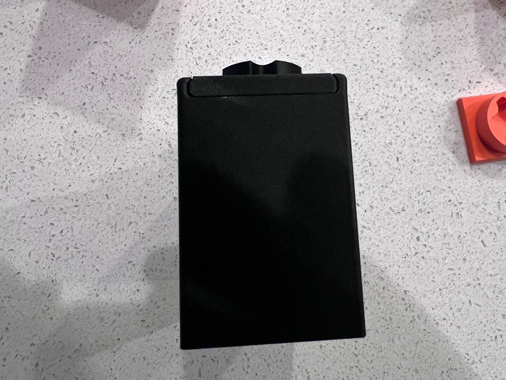 Rugged Obsidian piston/booster storage case and multi-tool