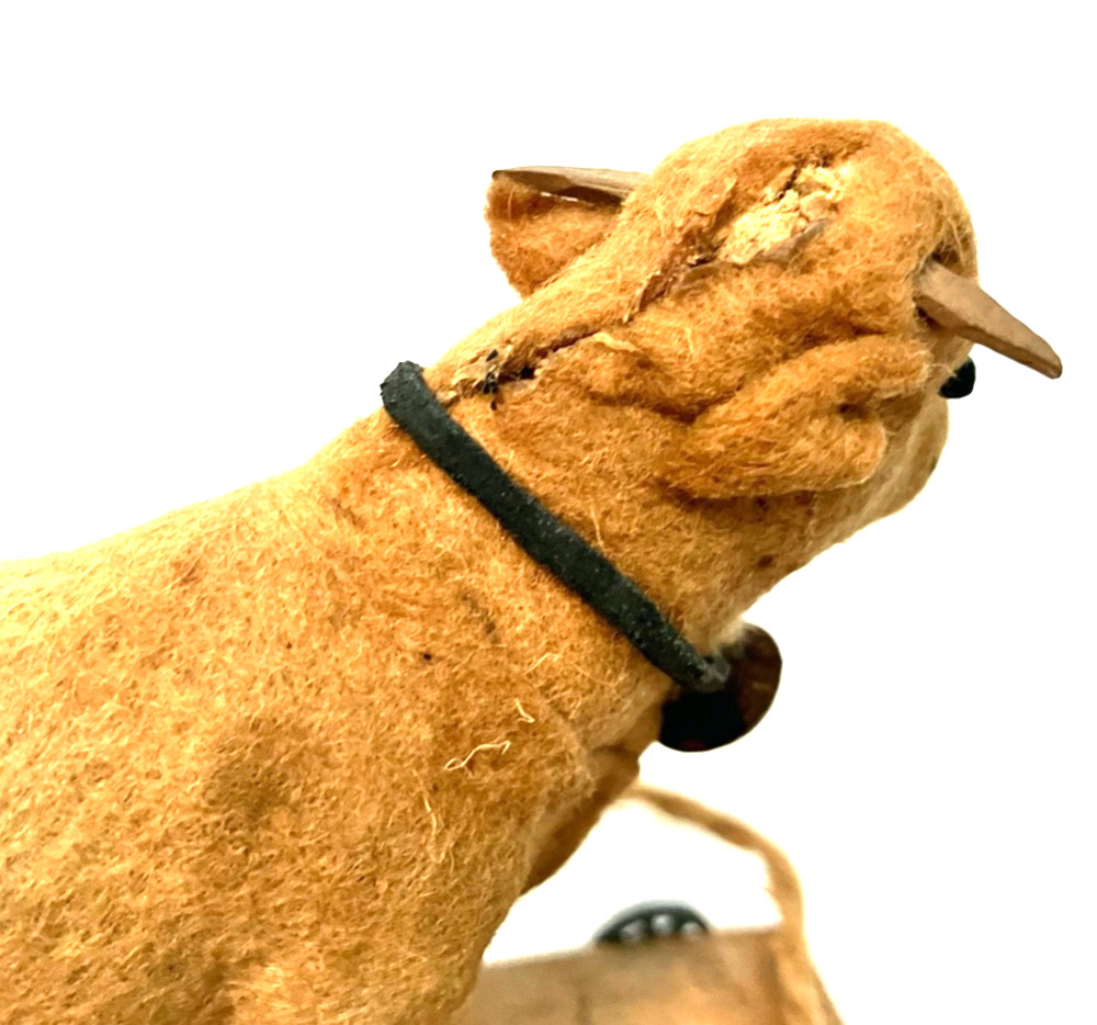 Antique childs felt covered pull toy