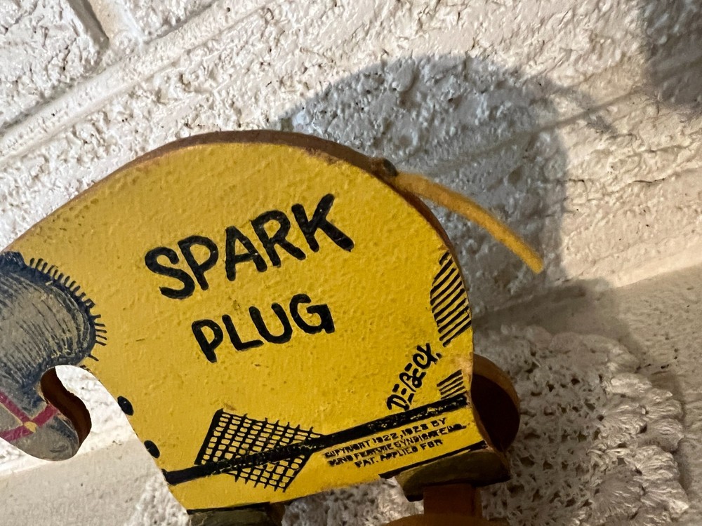 Debeck Spark Plug Platform toy