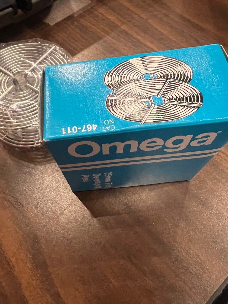 Omega 35mm film developing reel in box
