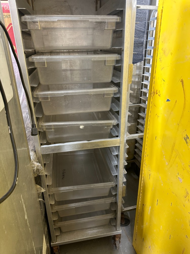 Enclosed rolling sheet pan rack on wheels