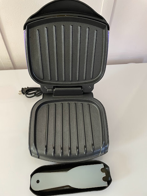 New George Foreman Lean Mean Fat Grilling Machine