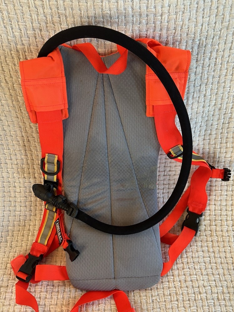 CamelBak Hi-Viz Hydration Pack Includes Cleaning Kit Orange W/ Reflective Strips