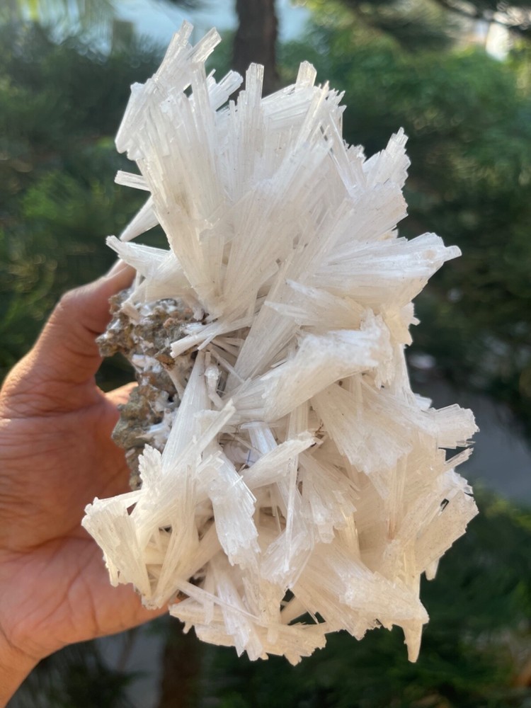 Glossy scolecite spray on basalt matrix