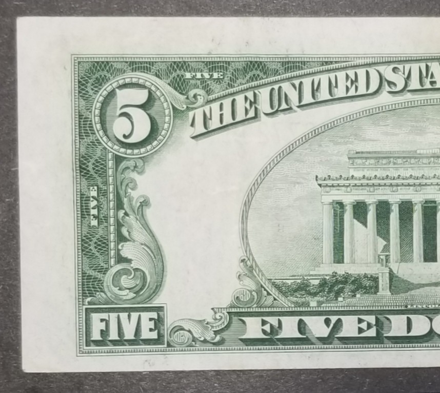 1928 F $5 US RED SEAL WITH FRONT AND BACK PRINT SHIFT ERROR LIGHTLY CIRCULATED