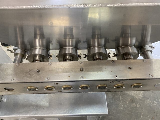 R.F. Auger Depositor