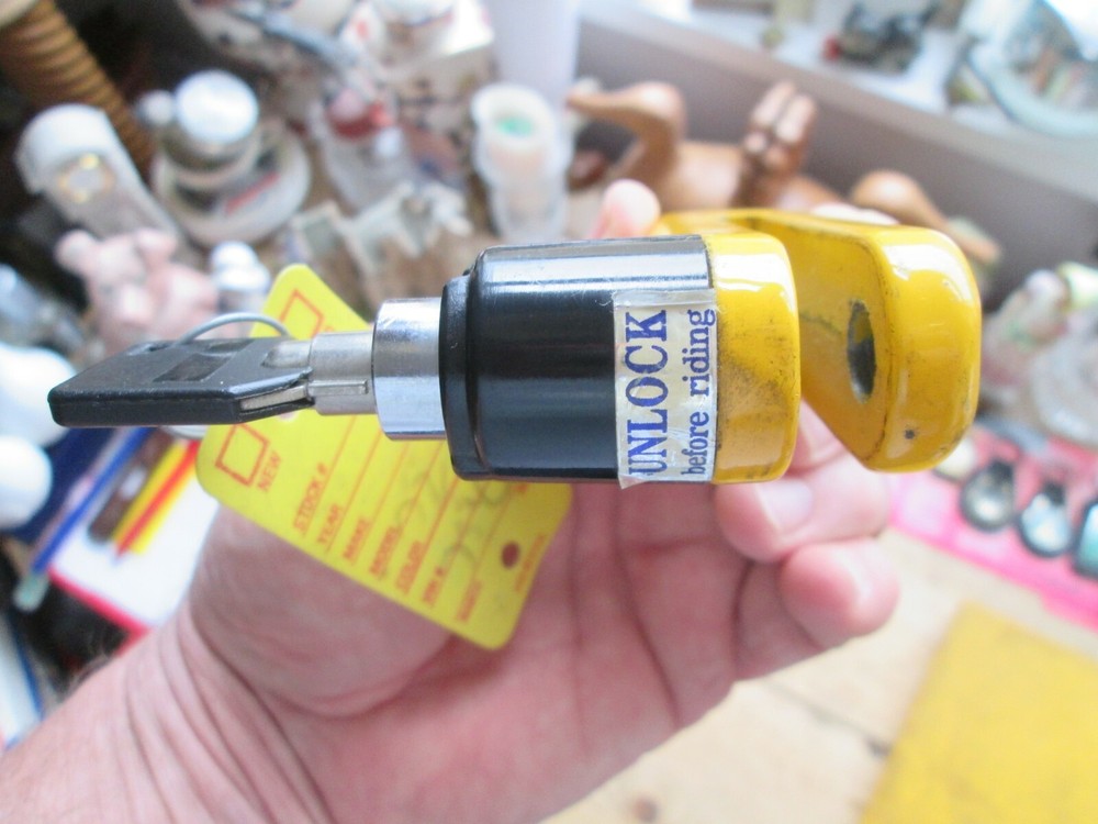 MOTORCYCLE DISC LOCK USED - TITAN YELLOW DISC LOCK