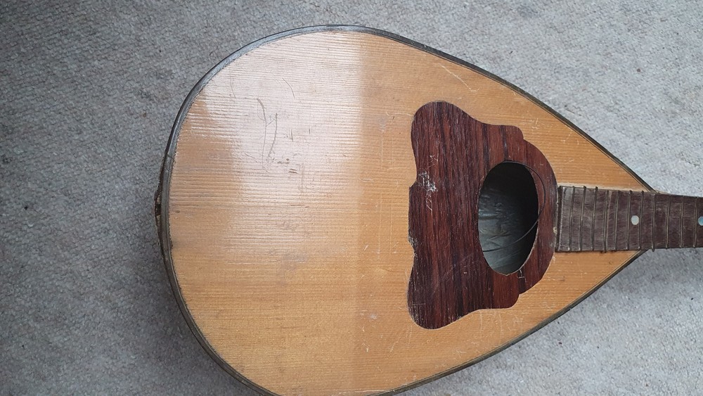 old mandolin, needs repair