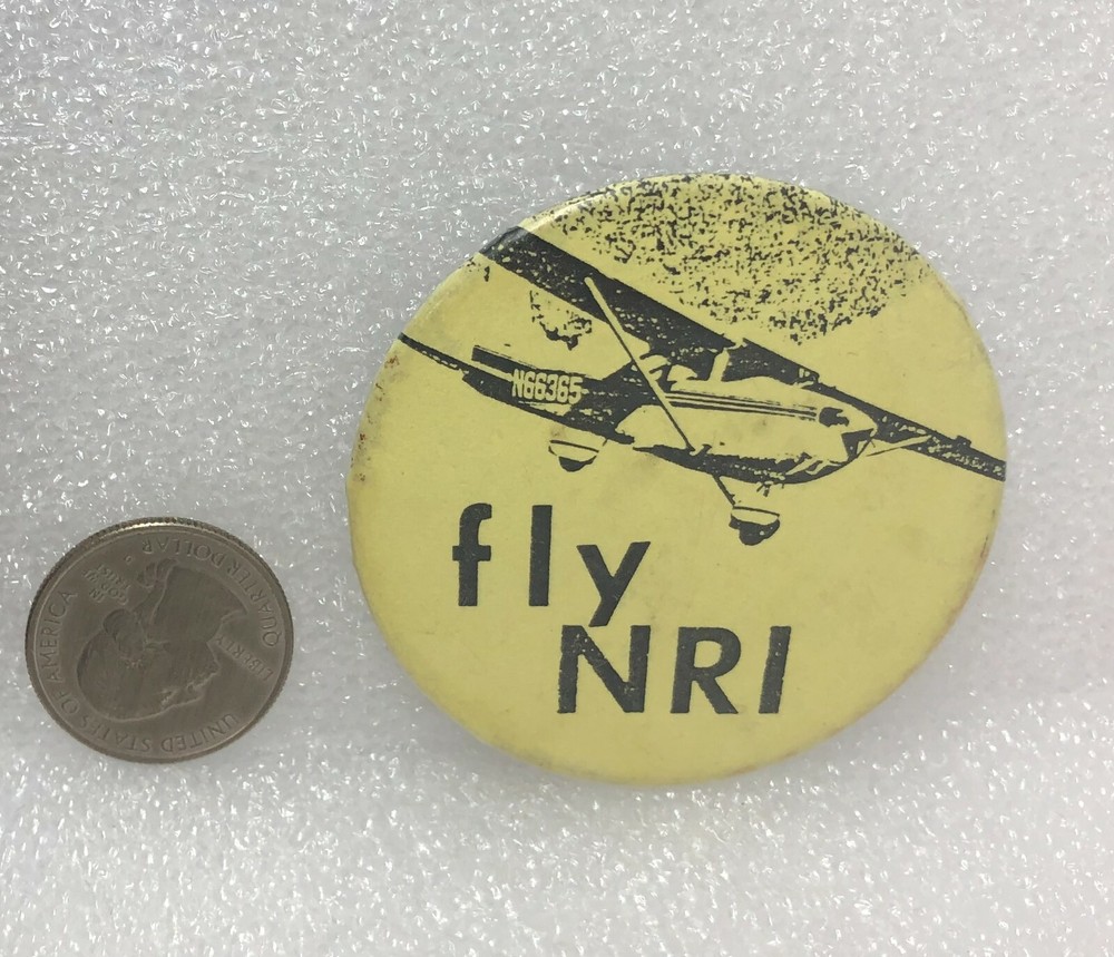 Fly NRI Airplane Pin