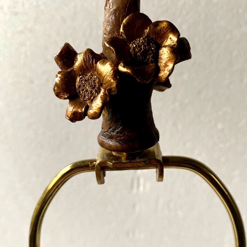 Antique floral and bird table lamp featuring a rustic tree-branch stem