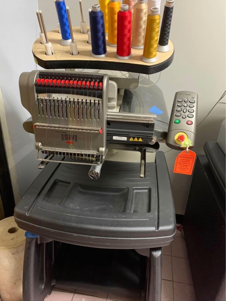 Four Melco embroidery machines.