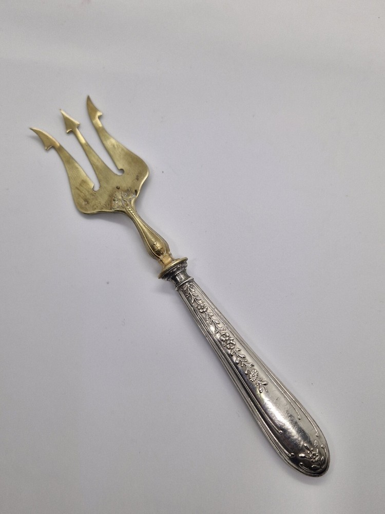 Vintage Antique brass fork with silver handle