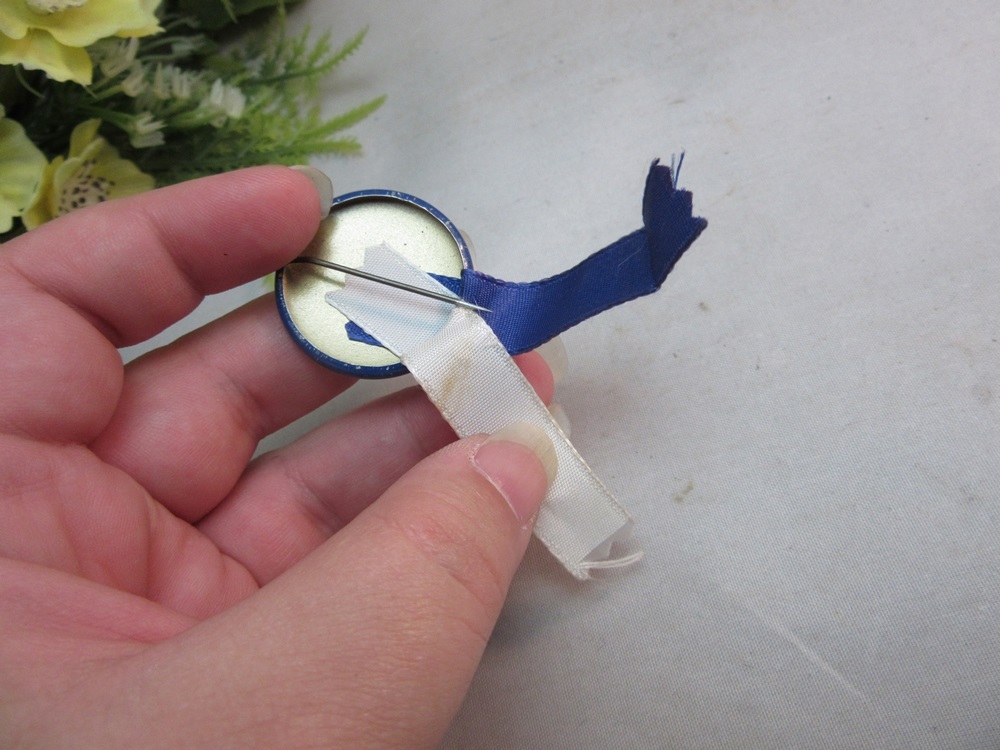 16 years employed by Proctor & Gamble button,ribbon