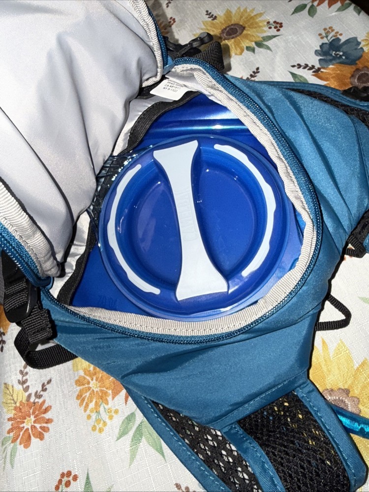 CamelBak Men's Lobo 9 70oz Hydration Pack, Moroccan Blue/grey