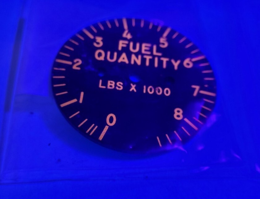 Fuel Quantity Indicator Dial, Glows Orange Under Black Light
