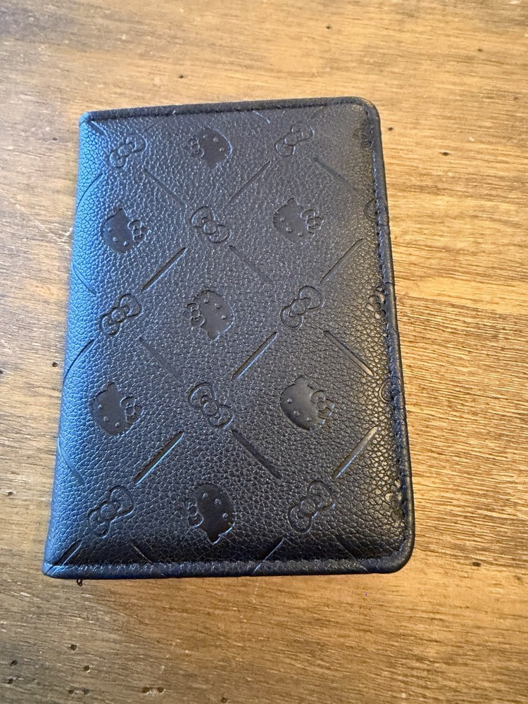SOLD OUT embossed black Passport Holder Hello Kitty
