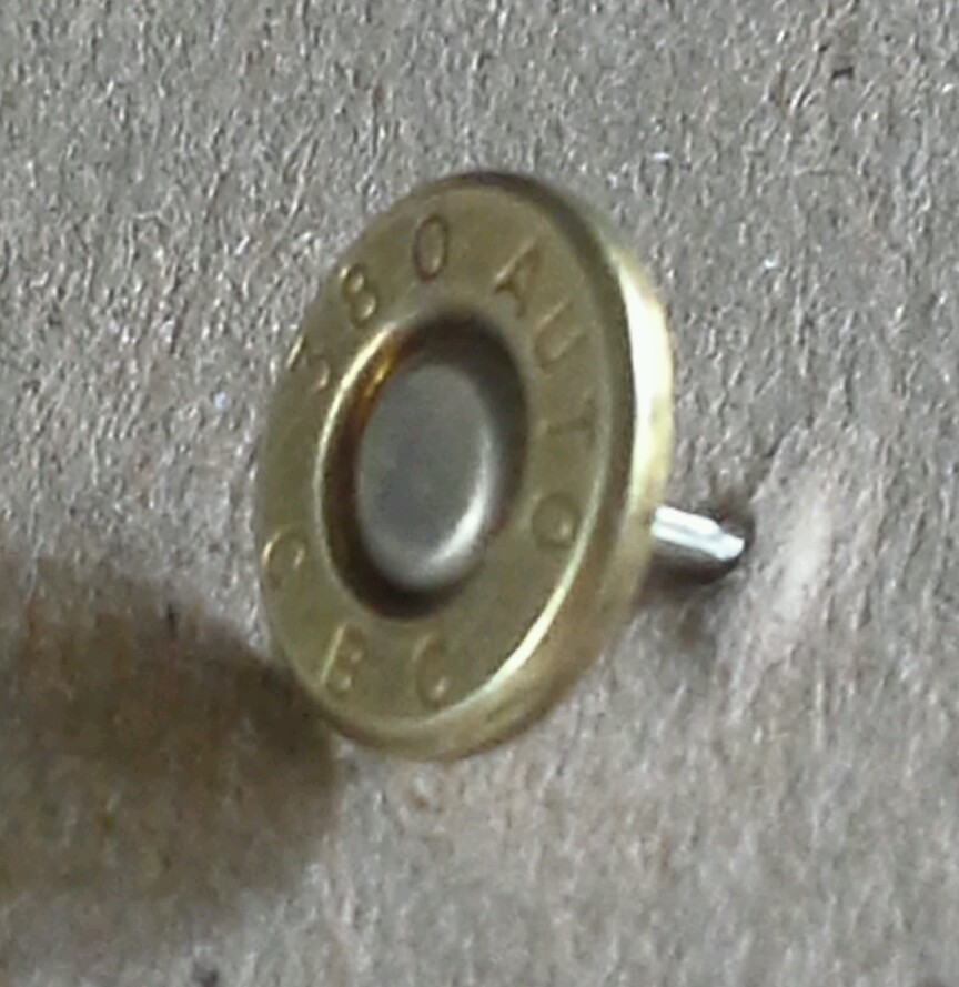 .380 Auto Bullet Lapel Pin. Unique un-dented primer! Most caliber available