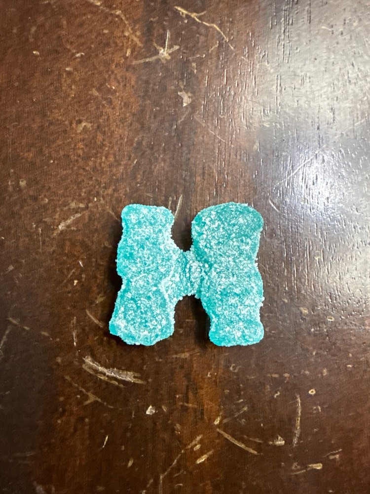sour patch kids holding hands