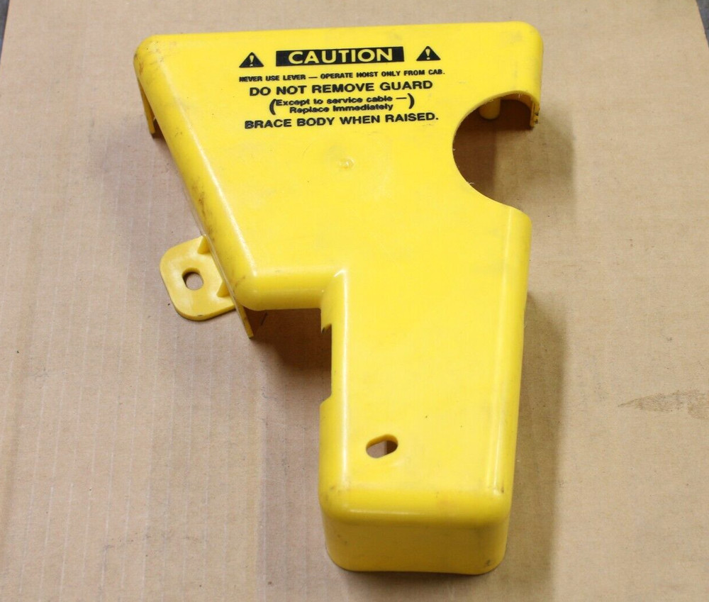 Control safety shield for truck hoist