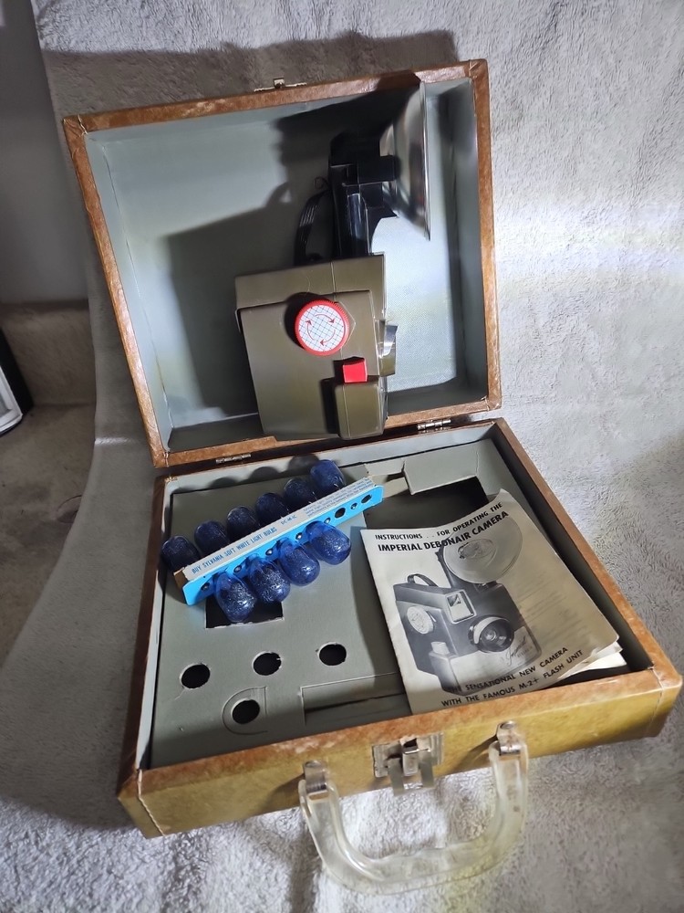 This vintage kit features an Imperial Debonair camera
