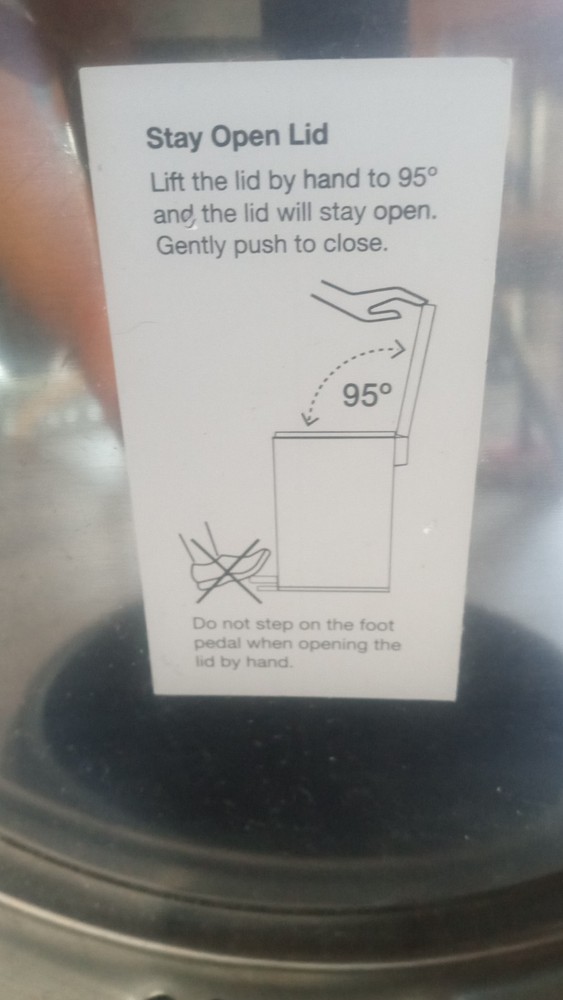 Small gray trash can