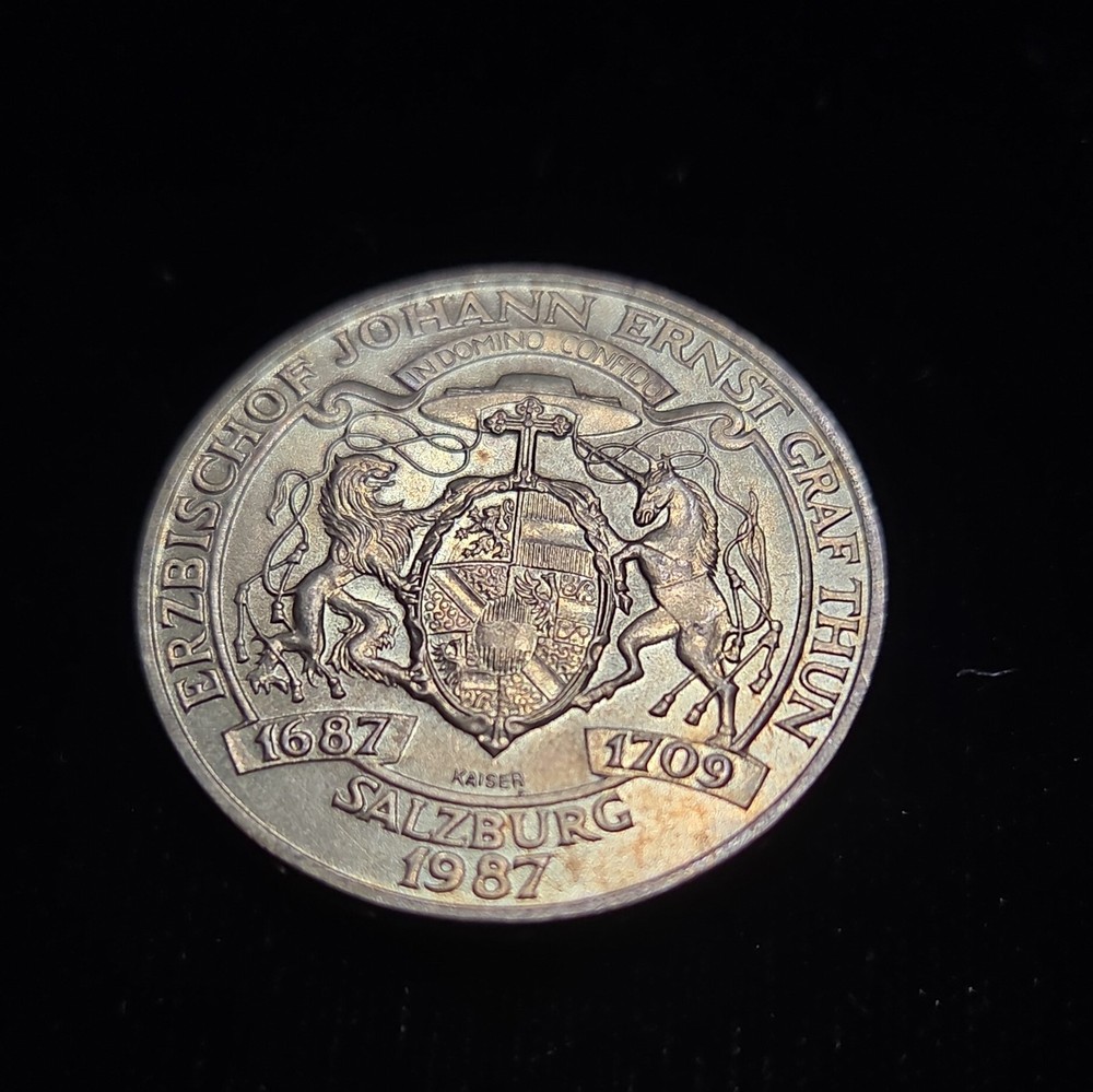 a 1987 Austrian 20 Schilling commemorative coin honoring Archbishop
