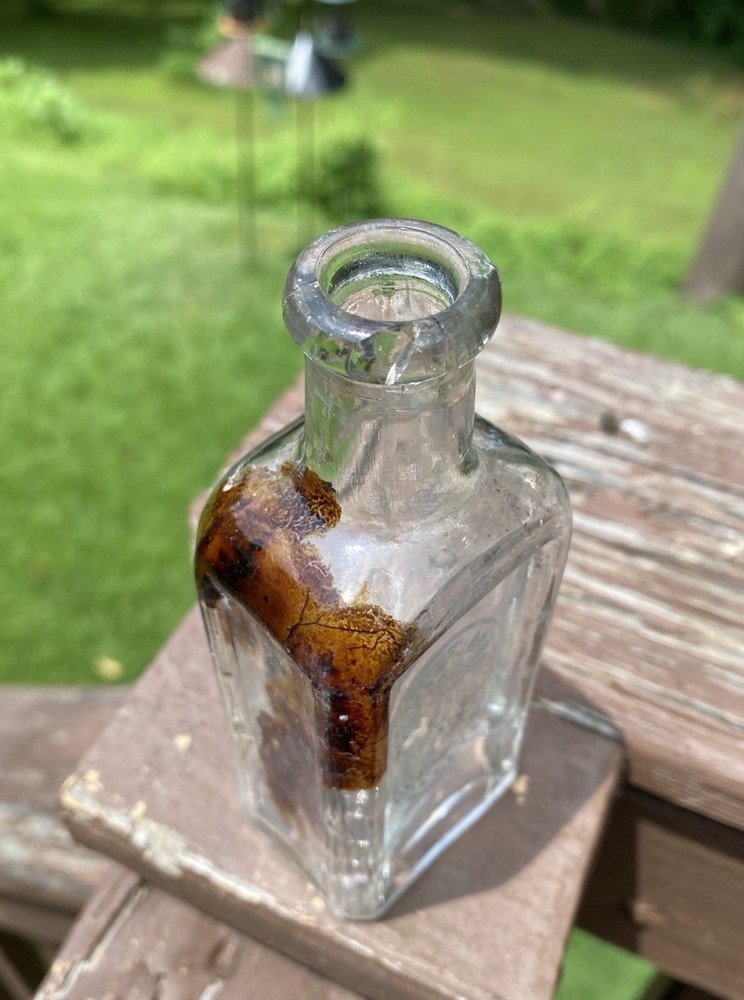 The Singer Sewing Machine Co Bottle