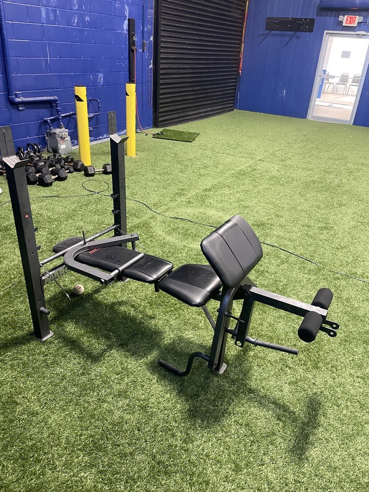 5-1 exercise bench used (comes with bar)