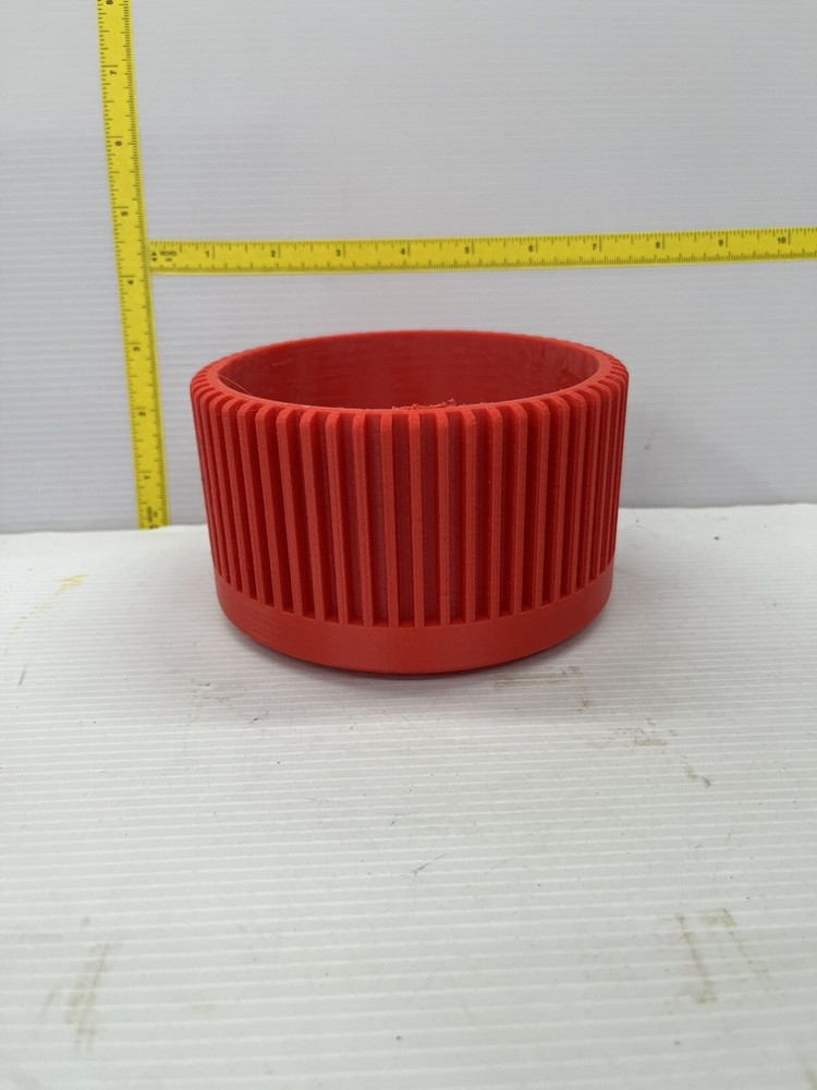 A  planter designed for modern aesthetics and functionality RED