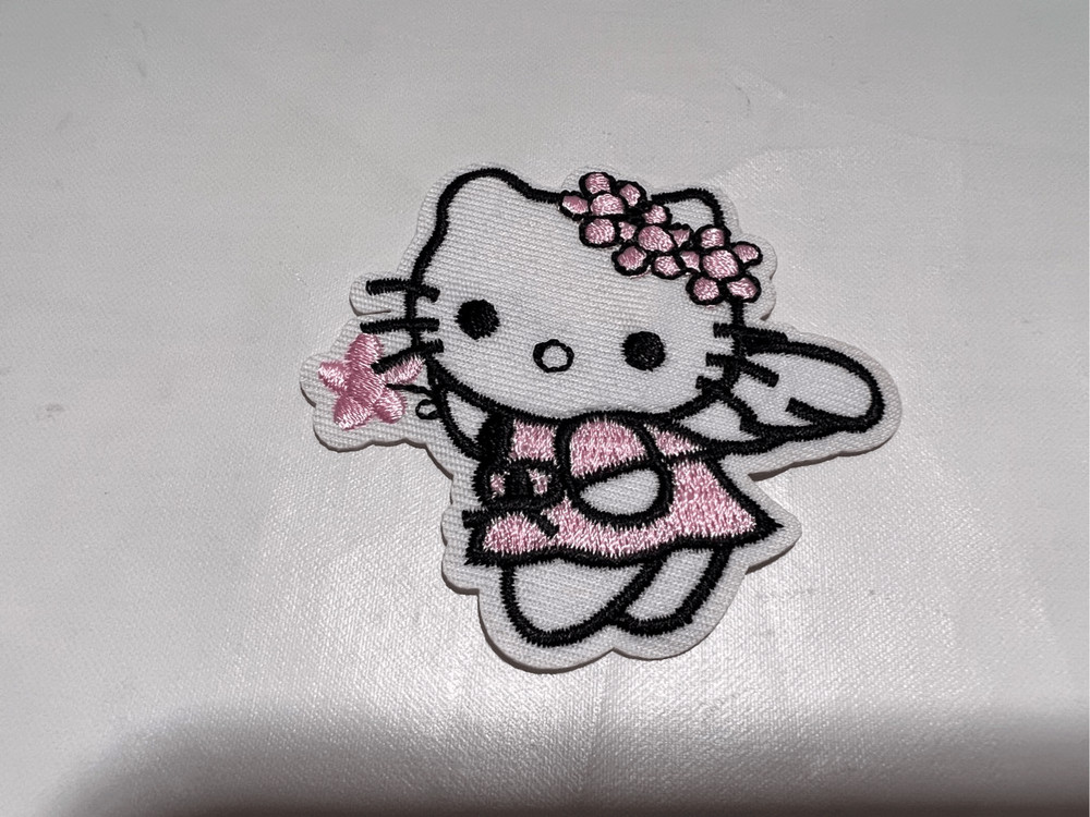 Hello Kitty as a Fairy with Flowers Iron on Patch