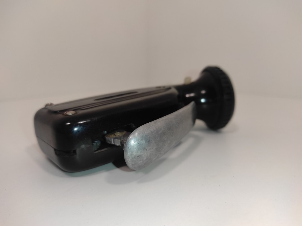 Soviet electrodynamic flashlight called "Zhuchok." "B-44."