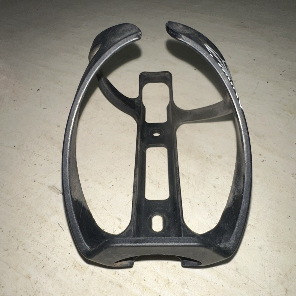 Supacaz Tron Poly Bottle Cage Black Side Loader Right Hand Load White Graphic
