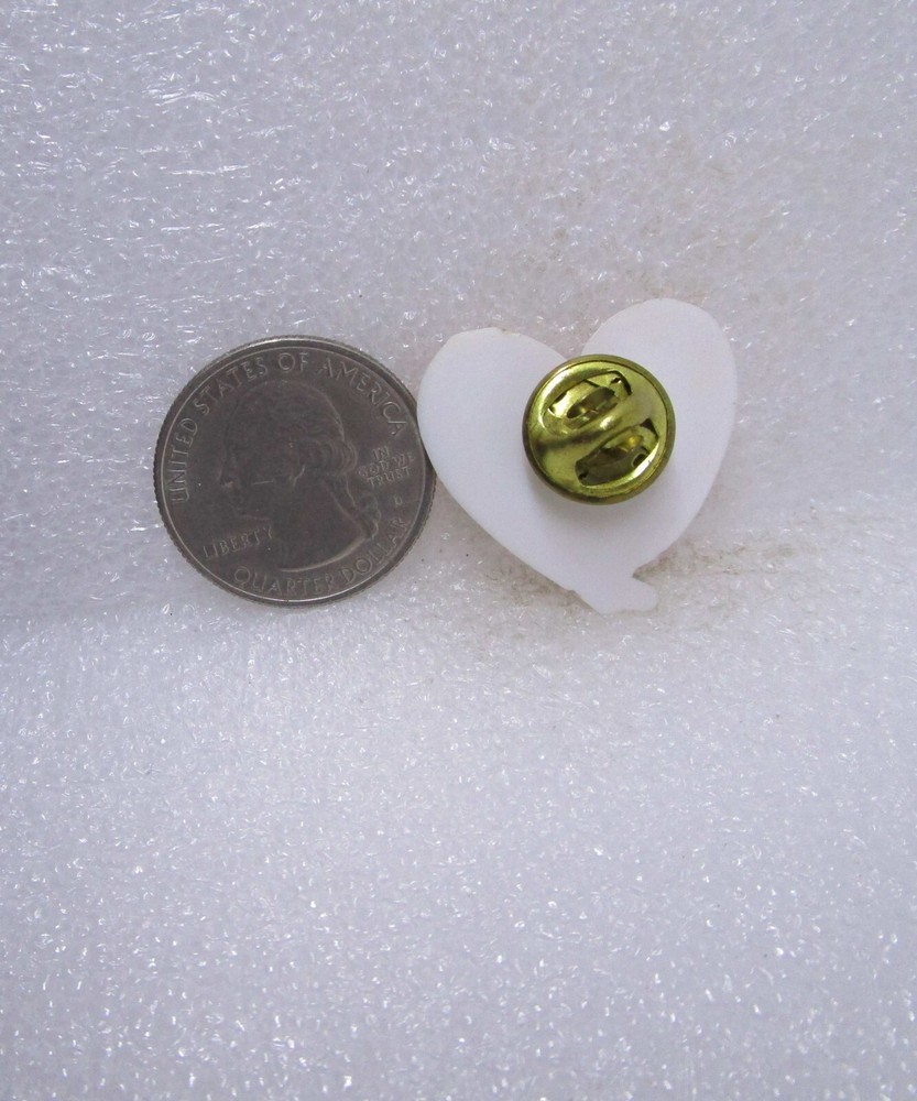 Stitches From The Heart Plastic Pin