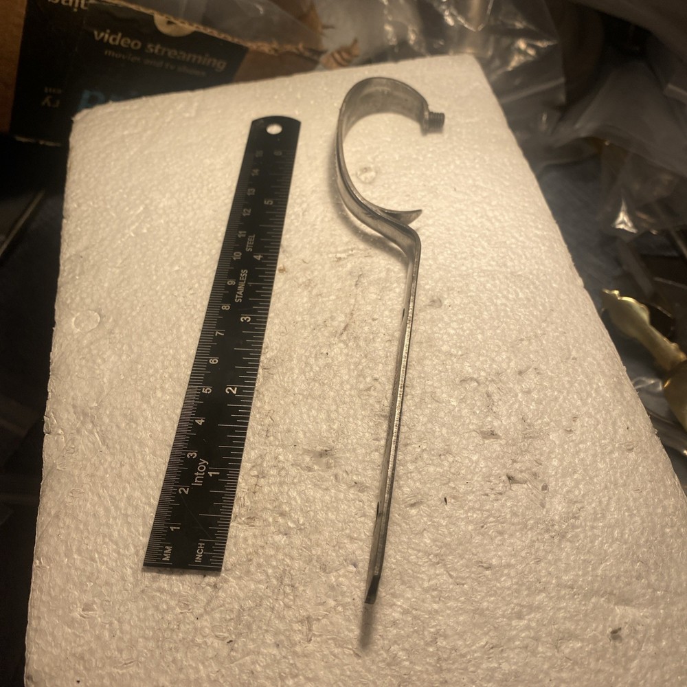 Silver Trigger Guard Of Unknown Brand.