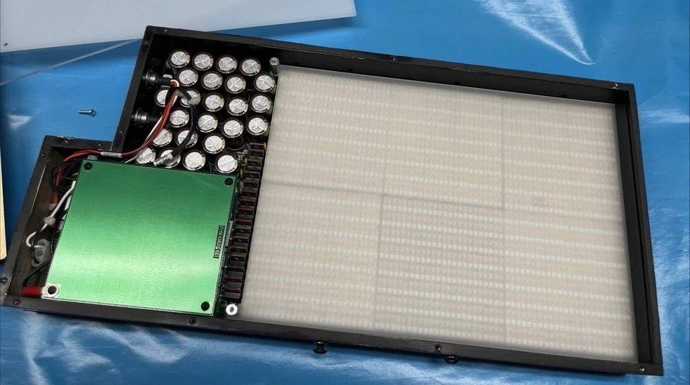 Electronic Chips Inside Testing Light Box For Perhaps Plastic Bottles Integrity.