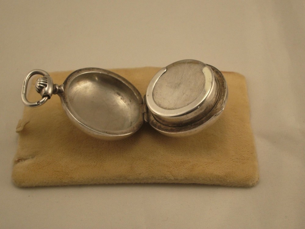 ANTIQUE SILVER COIN HOLDER